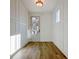 Inviting foyer with hardwood floors and bright lighting at 3165 Old Jonesboro Rd, Hapeville, GA 30354