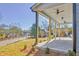 Spacious front porch with ceiling fans, offering a relaxing outdoor living space at 3165 Old Jonesboro Rd, Hapeville, GA 30354