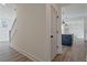 View down hallway towards kitchen with center island at 3165 Old Jonesboro Rd, Hapeville, GA 30354