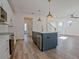 Gourmet kitchen features a large island and stainless-steel appliances at 3165 Old Jonesboro Rd, Hapeville, GA 30354