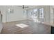 Sun-drenched living room featuring hardwood flooring, recessed lighting, and large windows offering plenty of natural light at 3165 Old Jonesboro Rd, Hapeville, GA 30354