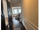 Inviting entryway with hardwood floors and a view of the living room at 7266 Gladstone Cir, Lithonia, GA 30038