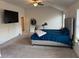 Spacious bedroom with plush carpet, vaulted ceiling, a ceiling fan and ensuite bathroom and walk in closet at 7266 Gladstone Cir, Lithonia, GA 30038