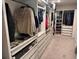 Large walk-in closet with lots of hanging space, drawers, shelves and shoe storage at 7266 Gladstone Cir, Lithonia, GA 30038