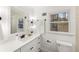 Bright bathroom with white vanity, black hardware, and stylish decor at 5548 Martina Way, Atlanta, GA 30338