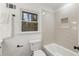 Clean bathroom with a white subway tile shower and modern fixtures at 5548 Martina Way, Atlanta, GA 30338