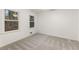 Calm bedroom with two windows, carpeting, and a fan at 5548 Martina Way, Atlanta, GA 30338