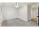 Bedroom with soft carpeting, white walls, and a door leading to the hall at 5548 Martina Way, Atlanta, GA 30338