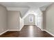 Large bedroom boasts hardwood floors, complemented by an attached closet or ensuite at 601 Wyndham Ct, Canton, GA 30115