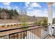 Outdoor balcony with black iron railings and scenic landscape views at 569 Stone Field Nw Run, Marietta, GA 30060