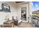 Cozy balcony seating area with comfortable chair and view of the Primary suite at 569 Stone Field Nw Run, Marietta, GA 30060