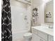 Well-lit bathroom with vanity and shower with shower and tub combination at 569 Stone Field Nw Run, Marietta, GA 30060