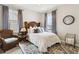 Charming bedroom with cozy decor and comfortable furnishings at 569 Stone Field Nw Run, Marietta, GA 30060