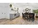 Charming dining area with modern lighting, chic shelving, and a stylish table set for gatherings at 569 Stone Field Nw Run, Marietta, GA 30060