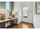 Charming entryway featuring hardwood floors, stylish lamps, and decorative accents at 569 Stone Field Nw Run, Marietta, GA 30060