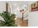 Inviting entryway featuring hardwood floors, staircase, and stylish decor at 569 Stone Field Nw Run, Marietta, GA 30060