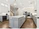 Bright, expansive kitchen featuring a large island, stainless steel appliances, and hardwood floors at 569 Stone Field Nw Run, Marietta, GA 30060