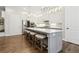 Open concept kitchen with a large island, stainless steel appliances, and ample cabinet space at 569 Stone Field Nw Run, Marietta, GA 30060
