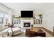 Living room with hardwood floors, fireplace and custom cabinets at 569 Stone Field Nw Run, Marietta, GA 30060