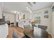 Modern kitchen area with stainless steel appliances and a cozy breakfast nook with seating at 1100 Bradford Park Dr, Auburn, GA 30011