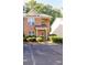 Charming brick home featuring a well-maintained front yard with lush greenery at 3831 Austin Park Ln, Decatur, GA 30032