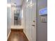 Welcoming hallway with gleaming hardwood floors and an elegant mirror at 3831 Austin Park Ln, Decatur, GA 30032