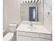 Bathroom featuring a white vanity and large mirror at 730 Taylor School Dr, Lawrenceville, GA 30043
