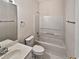 Full bathroom with shower-tub combo at 730 Taylor School Dr, Lawrenceville, GA 30043