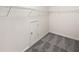 Well-organized walk-in closet with shelving and carpeting providing ample storage space at 730 Taylor School Dr, Lawrenceville, GA 30043