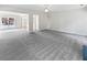 Open living room with view of dining room and front entry at 730 Taylor School Dr, Lawrenceville, GA 30043