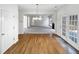 View of living area with doors to exterior and open to kitchen at 730 Taylor School Dr, Lawrenceville, GA 30043