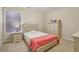 Cozy bedroom featuring a white painted wood bed frame and matching furniture set at 1135 Chandler Ridge Dr, Lawrenceville, GA 30045