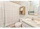 Cozy bathroom with white shower curtain and a single sink at 171 W Fork Way, Temple, GA 30179