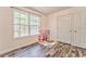 bedroom with wood flooring and a window that provides lots of natural light at 171 W Fork Way, Temple, GA 30179