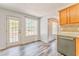 Cozy kitchen with plenty of natural light and back patio access at 171 W Fork Way, Temple, GA 30179