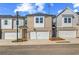 Charming townhome featuring a one-car garage and brick accents at 312 Shine Dr, Stockbridge, GA 30281