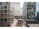 Urban courtyard with outdoor seating and landscaping, surrounded by modern buildings at 145 15Th St # Apt 1023, Atlanta, GA 30309