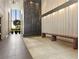 Spacious lobby with carpet, bench, and modern art installation, creating an inviting atmosphere at 145 15Th St # Apt 1023, Atlanta, GA 30309