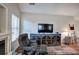 Bright living room with vaulted ceiling, fireplace, and hardwood floors at 3 William Ne Dr # 3, White, GA 30184