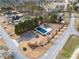 Community pool offers a refreshing retreat, complemented by a convenient parking area and charming neighborhood surroundings at 4391 Chatuge Dr, Buford, GA 30519
