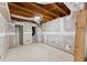 Unfinished basement with stud walls at 4391 Chatuge Dr, Buford, GA 30519