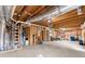 Unfinished basement featuring exposed ductwork and framed spaces ready for customization, offering a blank canvas at 4391 Chatuge Dr, Buford, GA 30519