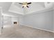Spacious bedroom with a ceiling fan and a fireplace for cozy evenings at 4391 Chatuge Dr, Buford, GA 30519