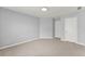 Neutral bedroom with plush carpet, white doors, and gray walls providing a blank canvas at 4391 Chatuge Dr, Buford, GA 30519