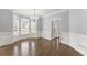Elegant dining room with bay windows and wainscoting at 4391 Chatuge Dr, Buford, GA 30519