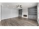 Large living room with built-in bookshelves and a cozy fireplace at 4391 Chatuge Dr, Buford, GA 30519