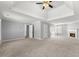 Large bedroom featuring a trey ceiling, fireplace, and doorways to other rooms at 4391 Chatuge Dr, Buford, GA 30519
