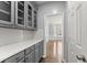 Walk-in pantry with plenty of cabinets and countertop space at 4391 Chatuge Dr, Buford, GA 30519