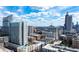 City skyline view showcasing modern buildings and residential areas at 860 Peachtree Ne St # 1008, Atlanta, GA 30308