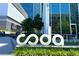 Exterior view of modern building with CODA signage at 860 Peachtree Ne St # 1008, Atlanta, GA 30308